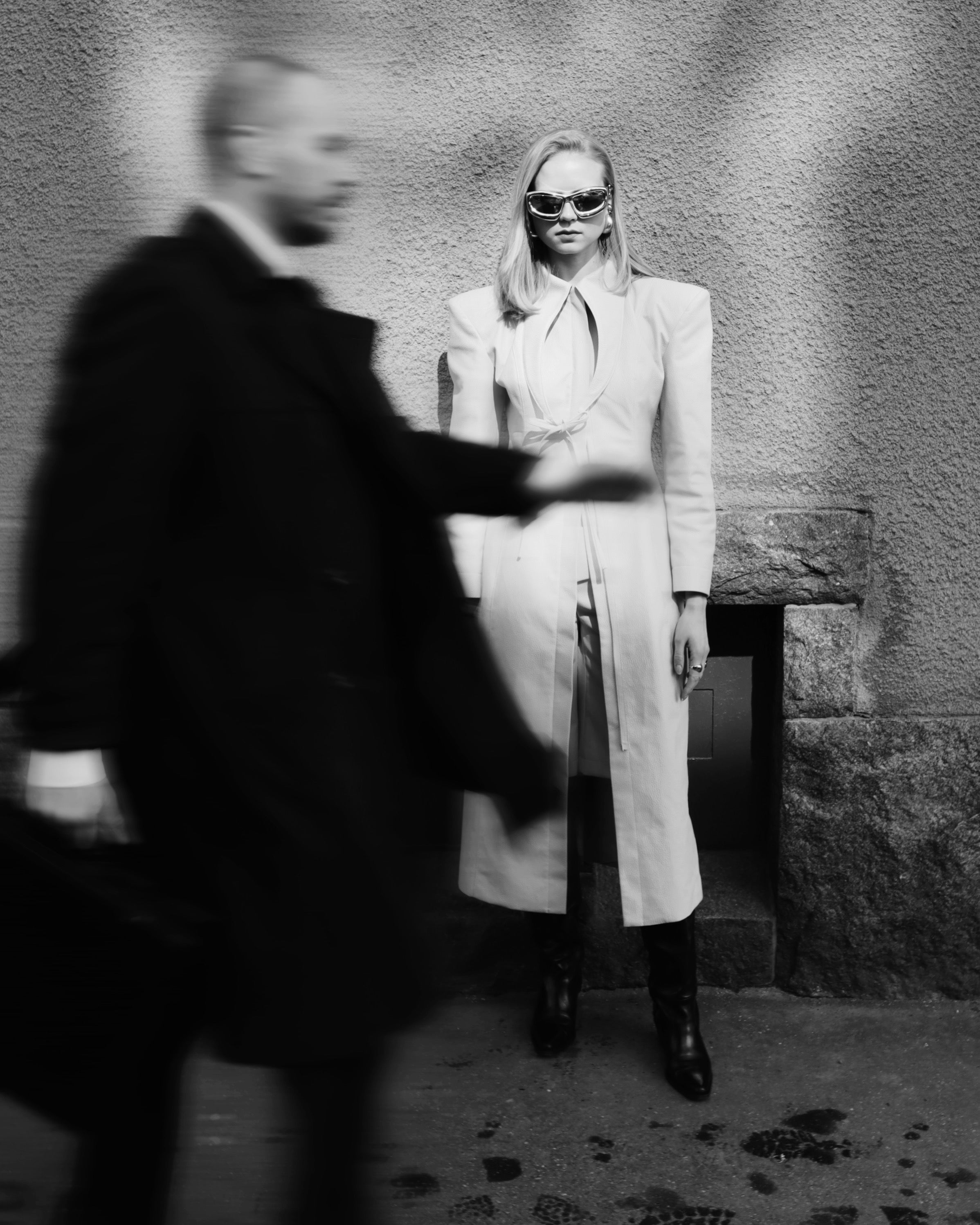 Model wearing long coat on the street